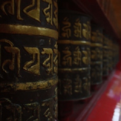 Buddhist Prayer Wheels at Mahakal Temple